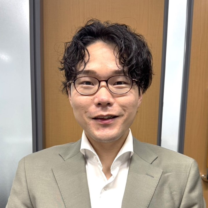 都築 拓也